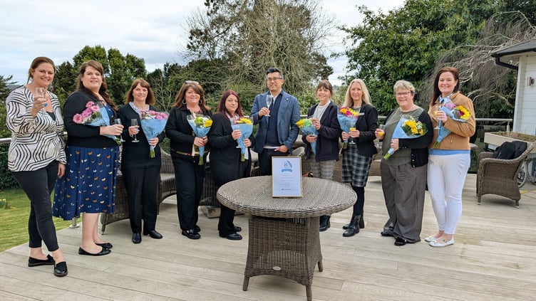 Staff from Rose Care Group celebrate their top 20 UK ranking